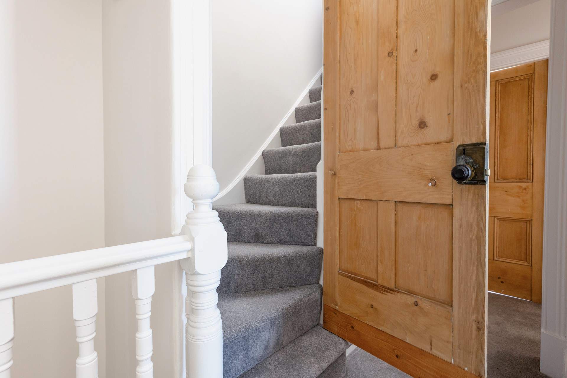 The turning staircase leads to the second floor. Please note stairs are slightly steeper than the main stairs.
