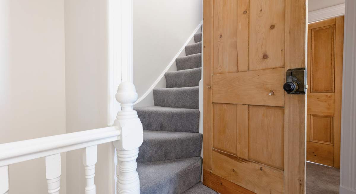 The turning staircase leads to the second floor. Please note stairs are slightly steeper than the main stairs.