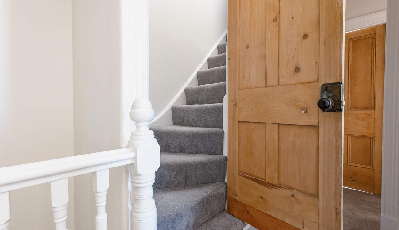 The turning staircase leads to the second floor. Please note stairs are slightly steeper than the main stairs.