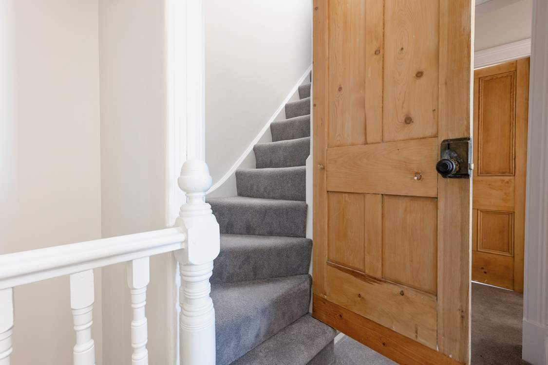 The turning staircase leads to the second floor. Please note stairs are slightly steeper than the main stairs.