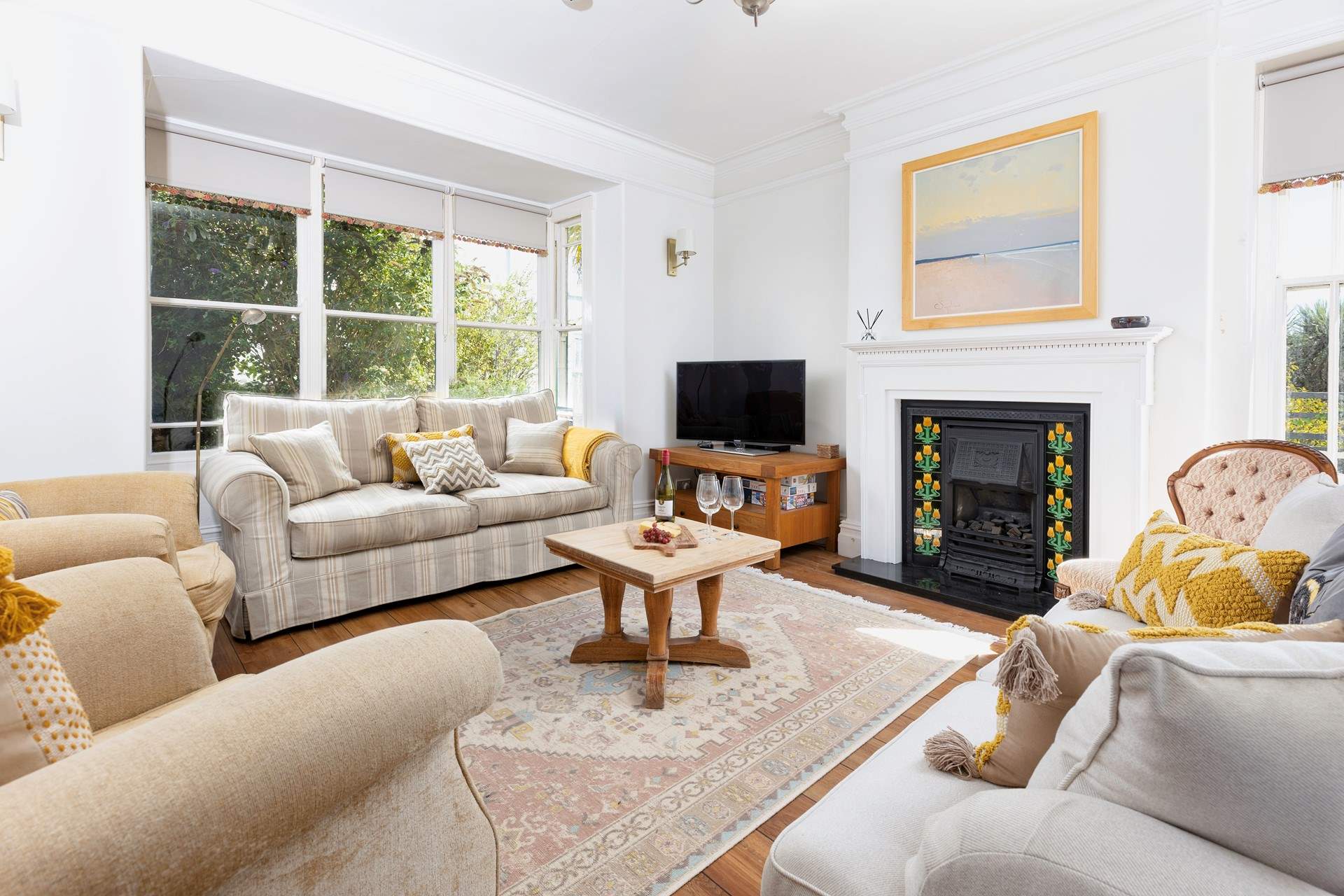 Gorgeous furnishings complement this lovely abode.  Please note the fire has now been replaced with a wood-burner.