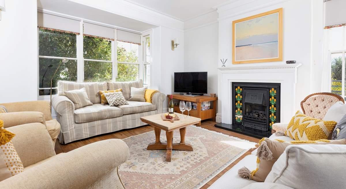 Gorgeous furnishings complement this lovely abode.  PLEASE Note the fire is now a newly installed log burner.