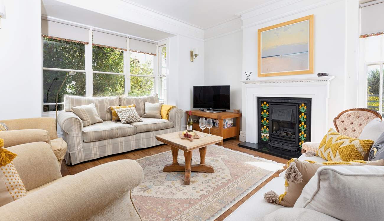 Gorgeous furnishings complement this lovely abode.  Please note the fire has now been replaced with a wood-burner.