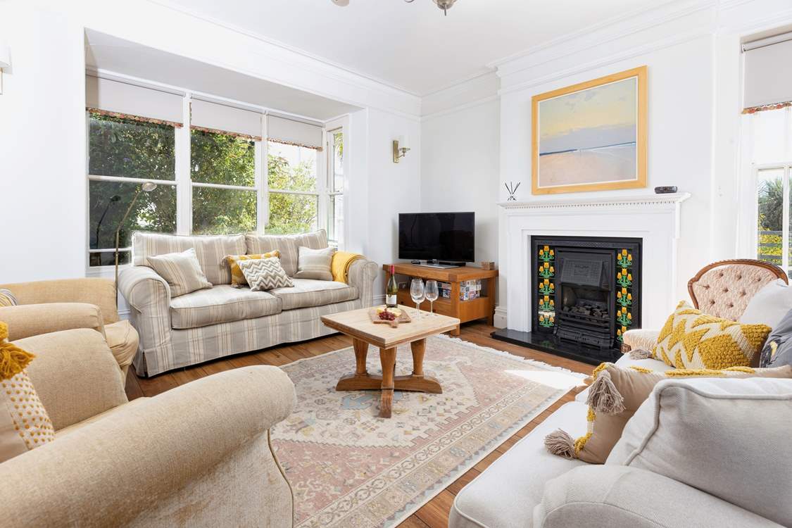 Gorgeous furnishings complement this lovely abode.  Please note the fire has now been replaced with a wood-burner.