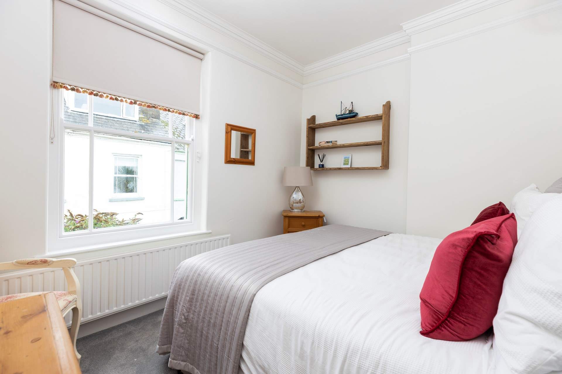 Bedroom 3 looks out to the side of the house.