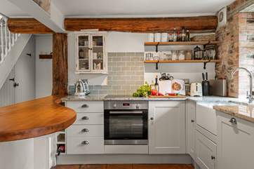 The homely kitchen has everything you'll need.