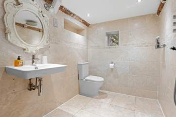 Downstairs you'll also find a fantastic wet-room great for refreshing yourself after a day on the beach.
