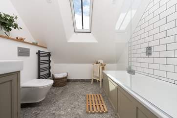 A gorgeous family bathroom makes up the first floor.
