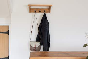 Hang up your coat and store your muddy boots in the fabulous entrance hall.
