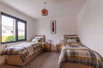 Bedroom 1 (pictured in the twin configuration) has 'zip and link' beds.