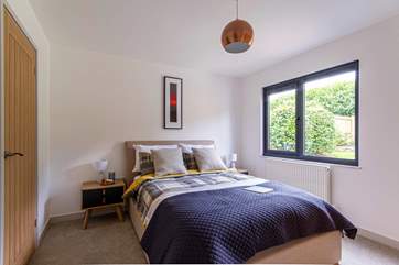 Bedroom 2 has a comfy double bed and en suite bathroom.