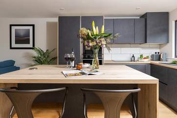 The super sleek kitchen has been beautifully crafted.