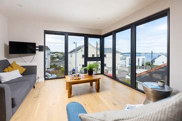The fabulous living area is on the first floor, affording great views of the ships out in Falmouth Bay.