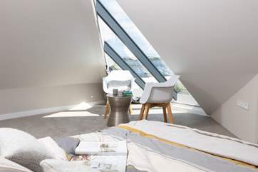 Enjoy your moment of peace and quiet in your own sitting area in the main bedroom.