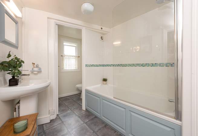 Unwind in the inviting bathtub after a day on the beach. The family bathroom is located on the first floor. 