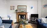 Relax in the welcoming sitting-room. - Thumbnail Image