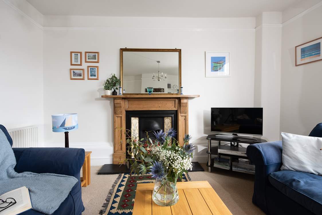 Relax in the welcoming sitting-room.