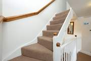 Located over two floors, the bedrooms are located on the top floor. Please note that there are steps leading into each bedroom and the landing has steps too!