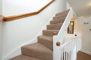 Located over two floors, the bedrooms are located on the top floor. Please note that there are steps leading into each bedroom and the landing has steps too!