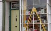 Located above the local greengrocers in the heart of St Agnes. The entrance to the cottage is next to the shop. Perfect for stocking up on all your holiday goodies.  - Thumbnail Image