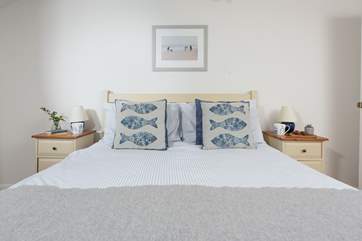 Bedroom one houses a luxurious king-size bed. Please note that there are steps leading into each bedroom and the landing has steps too!