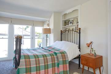 The second double bedroom has a feature iron bedstead.