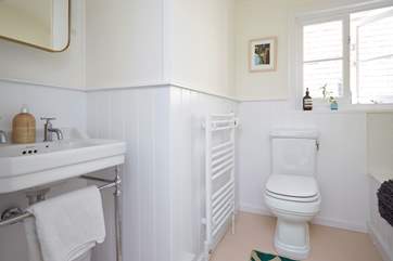 The family bathroom on the first floor has a bath with shower over.
