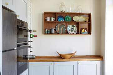 The kitchen has all you need to create a culinary delight.
