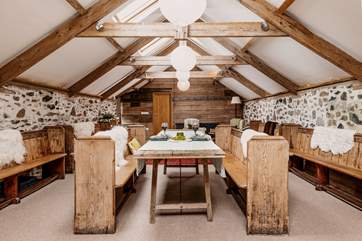 Light flows through the spacious dining-area.