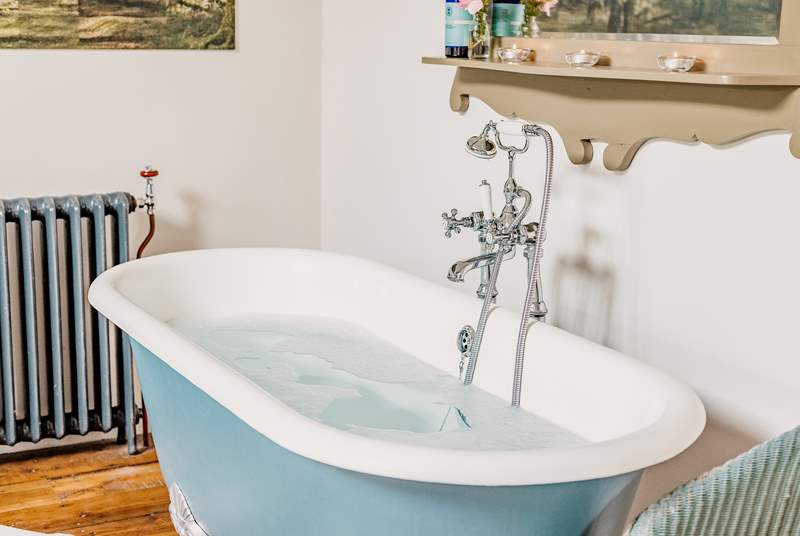 Unwind in the gorgeous bath tub after a day of exploring.