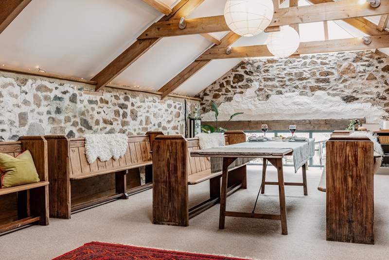 Pews and wooden beams complete the stunning dining-area.