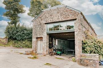 Underneath is a shared games area with books, board games and a table-tennis table.