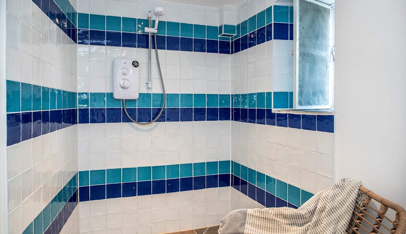 The ground floor wet-room is ideal for washing salty toes after a beach day.