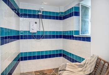 The ground floor wet-room is ideal for washing salty toes after a beach day.