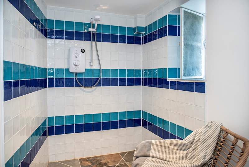 The ground floor wet-room is ideal for washing salty toes after a beach day.
