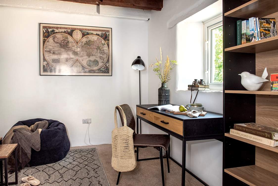 The snug is the perfect chill out zone where you can escape with a good book or use the desk if work calls.