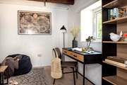 The snug is the perfect chill out zone where you can escape with a good book or use the desk if work calls.