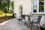 A bistro table outside the kitchen for a quiet moment.