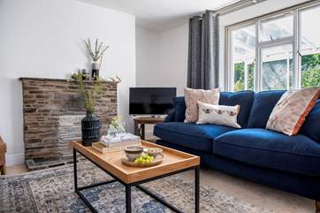The sitting-room is furnished with comfort in mind.