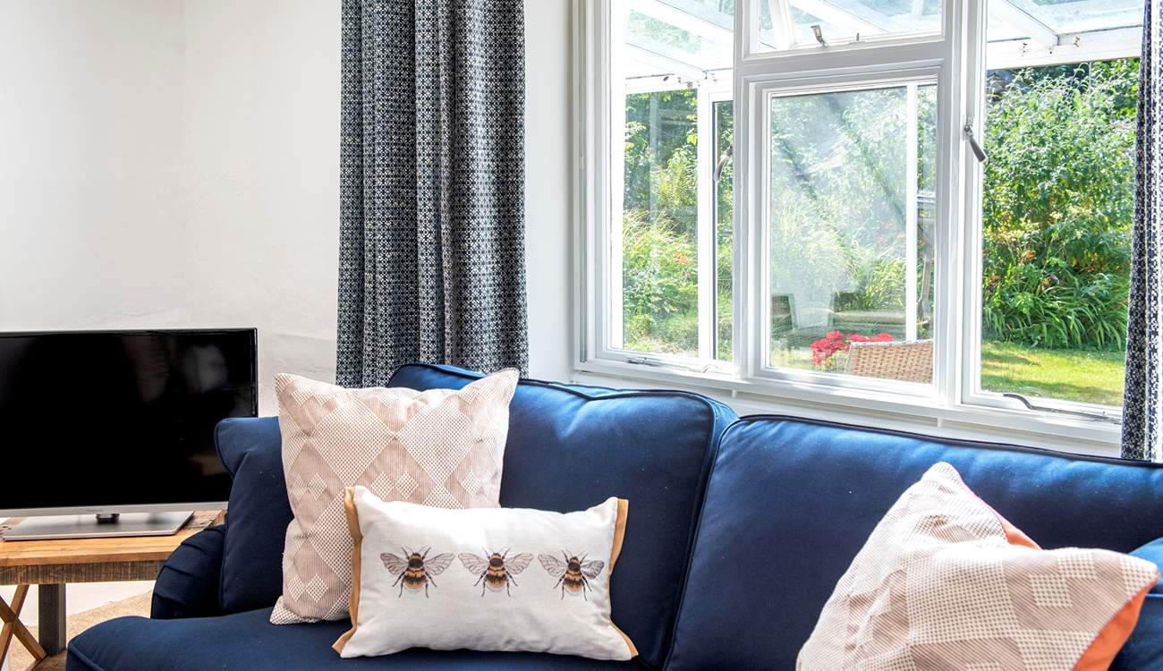 Relax on the comfy sofas and watch a movie on the Smart TV.
