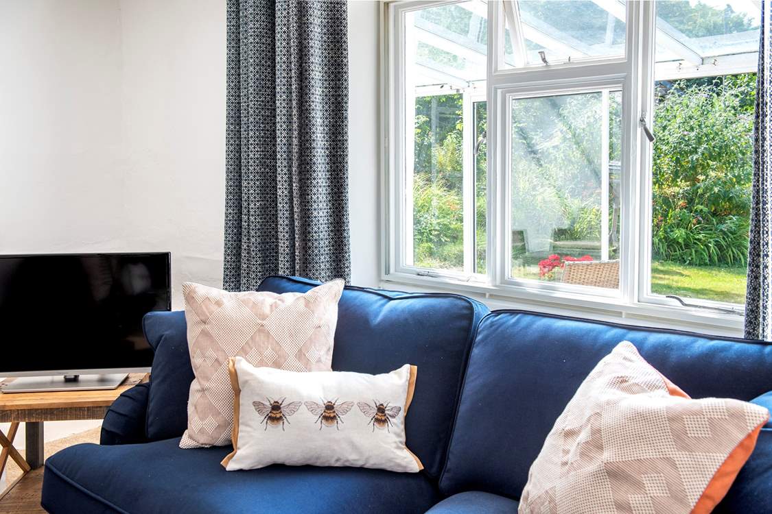 Relax on the comfy sofas and watch a movie on the Smart TV.