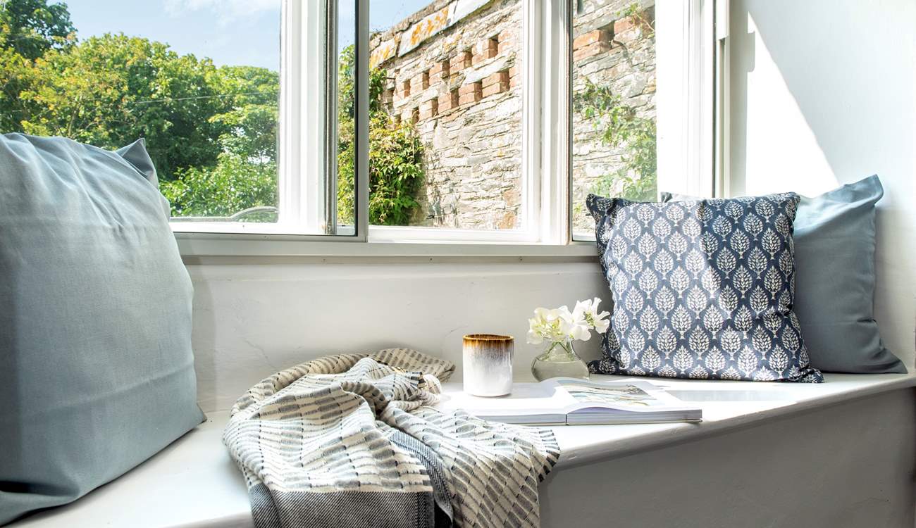 Take a pew on the window seat and relax with a good book.