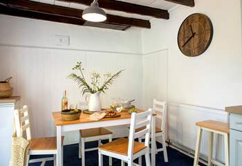 The kitchen table creates the perfect social space for chatting with the chef.
