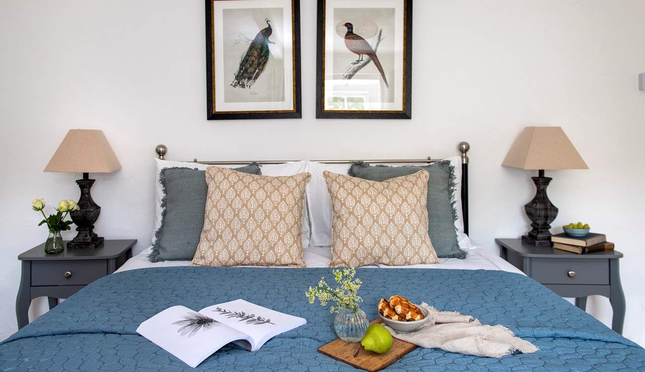Relaxing tones and gorgeous bedding.