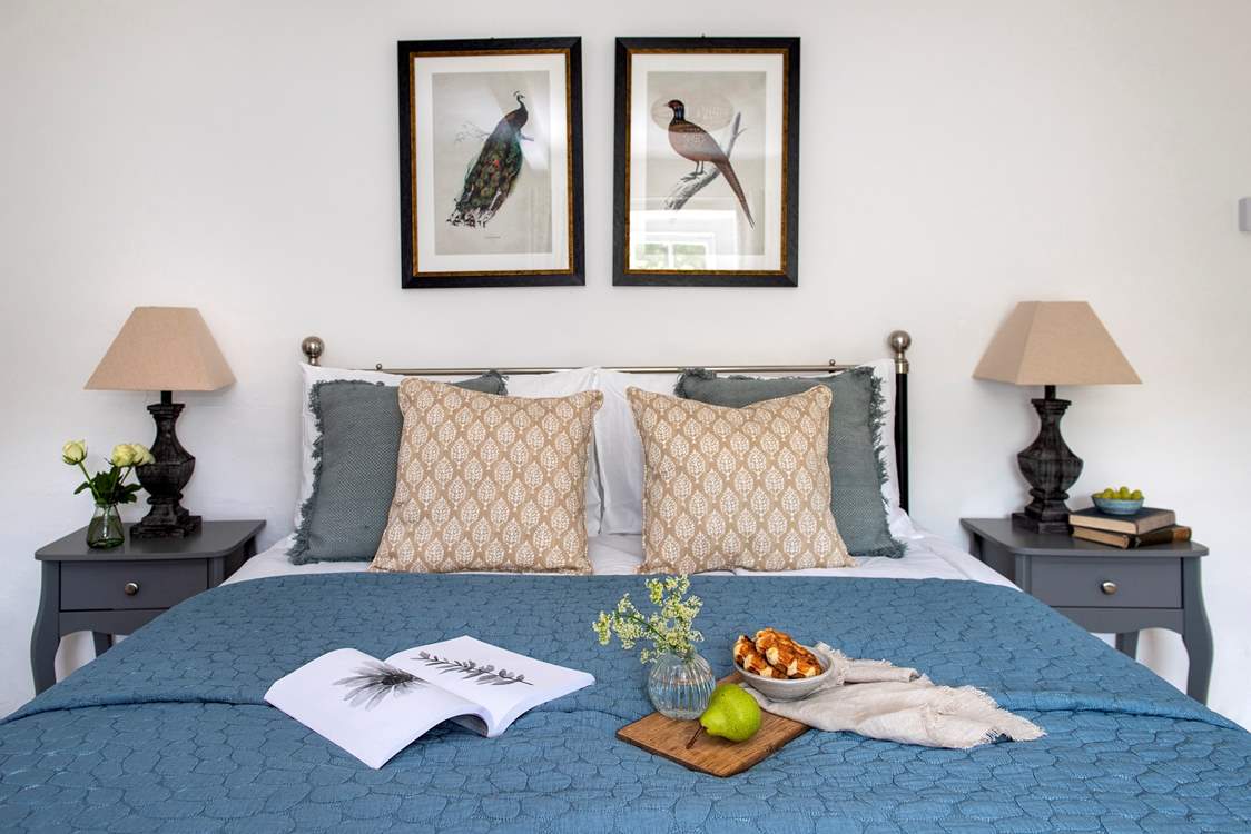 Relaxing tones and gorgeous bedding.