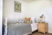 The pretty bed in bedroom 4.