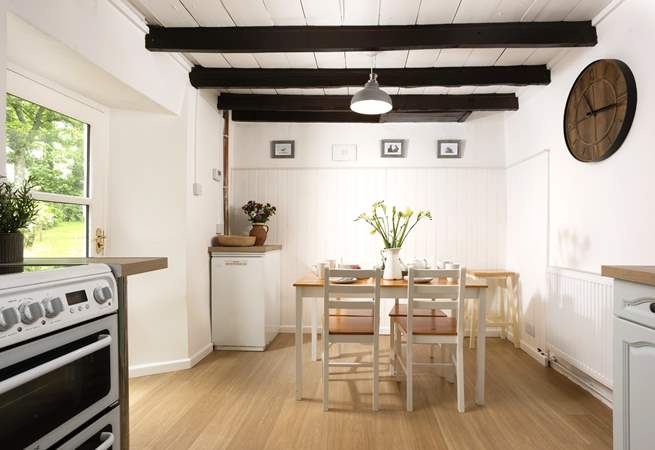 The kitchen table creates the perfect social space for chatting with the chef.