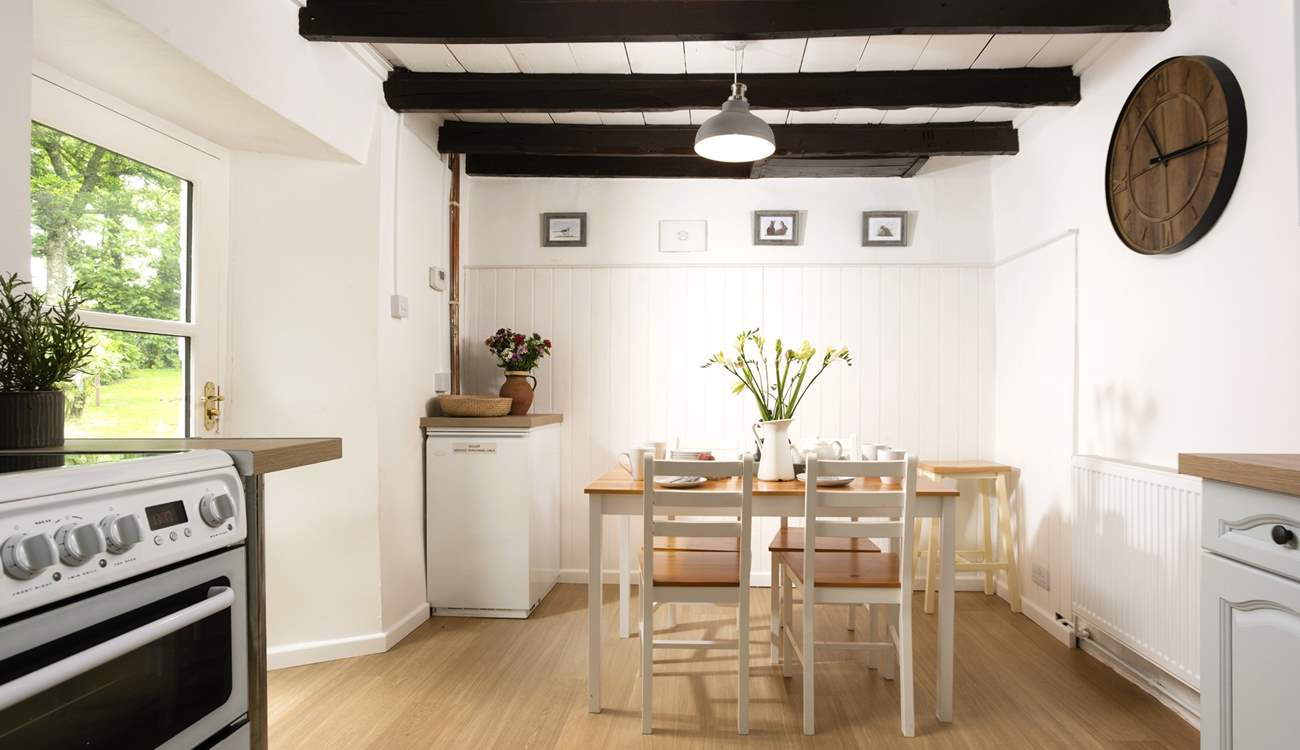 The kitchen table creates the perfect social space for chatting with the chef.
