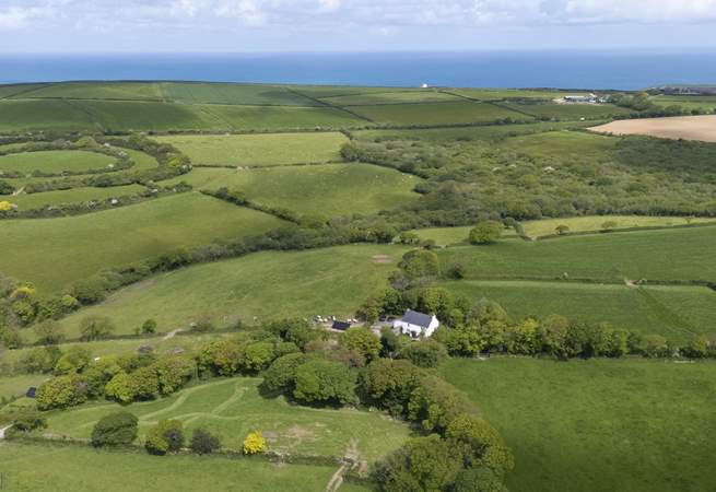 Nestled in the peace and tranquillity of the countryside , yet the coast is only a short distance away.