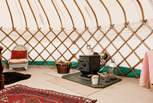 The wood-burning stove is a beautiful feature.